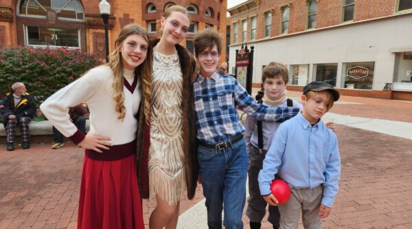 Five kids in Halloween costumes