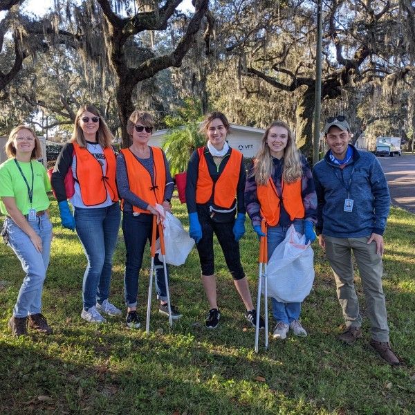 Volunteers picking up trash.