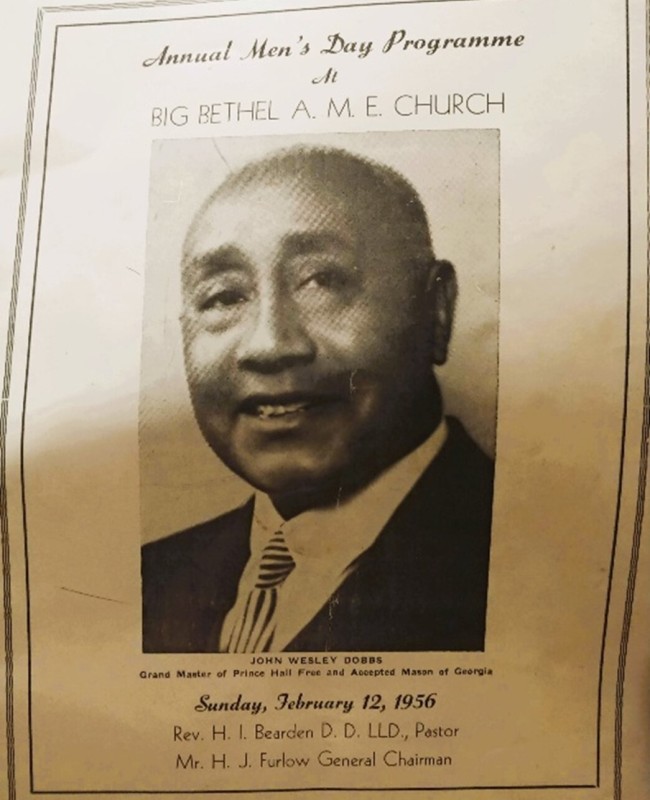 A church program featuring a large black and white photo of John Wesley Dobbs.