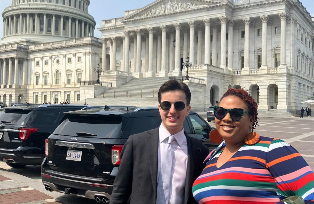 Participants at the first annual Hill Day pose in front of the Capitol