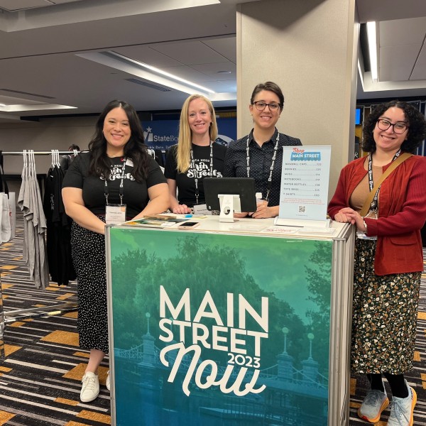 Staff members at the exhibitor hall at the Main Street Now Conference.
