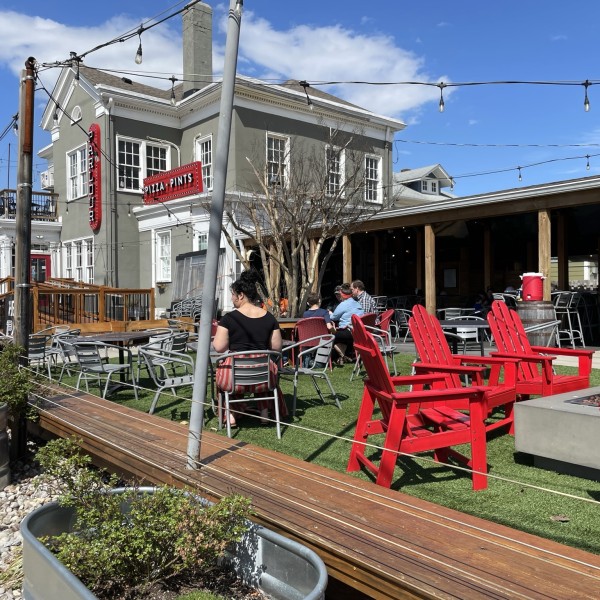 Parklet-style outdoor restaurant seating area.