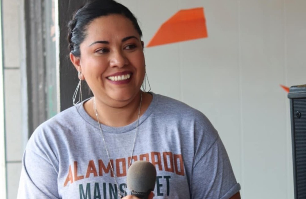 Woman posing with microphone