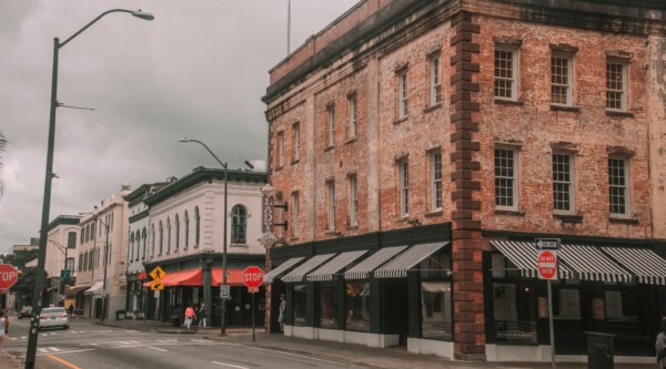 Historic brick buildings with awnings in Savannah, Georgia